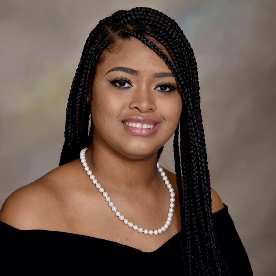 Professional headshot of Breasia Growe